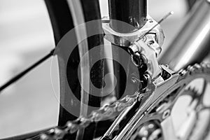 Marco detail view of a racing bicycle`s front derailleur