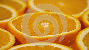 Marco shot of orange fruit and rotate.Close up flesh citrus orange. Nature background.