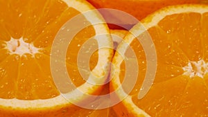 Marco shot of orange fruit and rotate.Close up flesh citrus orange. Nature background.