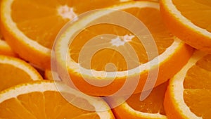 Marco shot of orange fruit and rotate.Close up flesh citrus orange. Nature background.