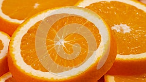 Marco shot of orange fruit and rotate.Close up flesh citrus orange. Nature background.