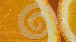 Marco shot of orange fruit and rotate.Close up flesh citrus orange. Nature background