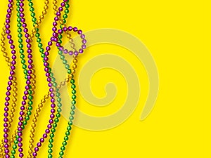 Mardi Gras beads in traditional colors.