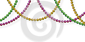 Mardi Gras beads in traditional colors.