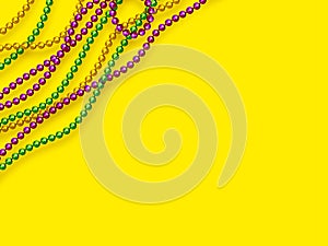 Mardi Gras beads in traditional colors.