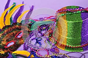 Mardi Gras feathered masks party hat beads photo