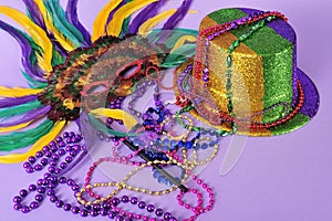 Mardi Gras feathered masks party hat beads photo