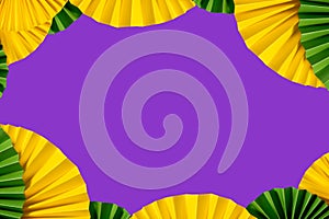 Mardi gras festive traditional color background. Abstract background yellow, green, purple. Paper fans Mardi gras