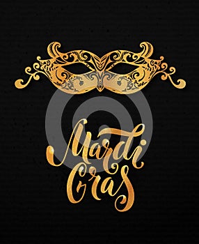 Mardi gras mask illustration. Vector golden type at black paper background. Masquerade invitation design.