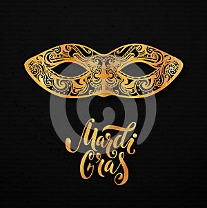 Mardi gras mask illustration. Vector golden type at black paper background. Masquerade invitation design.