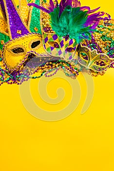 Mardi Gras Mask on yellow Background