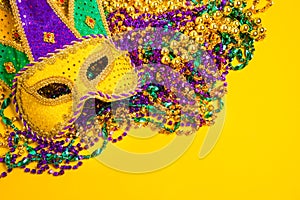 Mardi Gras Mask on yellow Background