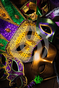 Mardi Gras masks on a dark background