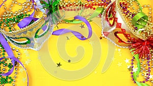 Mardi Gras overhead background with colorful masks and beads