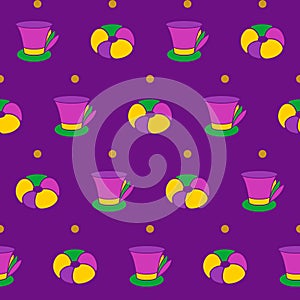 Mardi Gras seamless pattern with cylinders with feathers and king Cake. Abstract background.