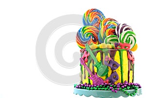 Mardi Gras theme on-trend candyland fantasy drip cake.