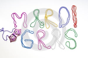 Mardi gras written in beads