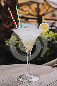 margarita cocktail made with tequila, salt and lime served in a martini glass