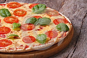 Margarita pizza with tomatoes, cheese and basil