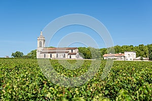 Margaux, France. Church and vineyards near Bordeaux