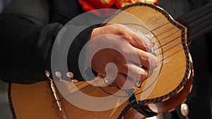 Mariachi Playing a Mexican Instrument Called Vihuela in Mexico City