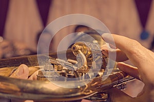 A mariachi trumpeter performing at a wedding reception. Clebration party time