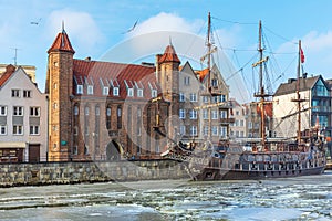 Mariacka Gate and a vintage pirate ship in the Motlawa, Gdansk