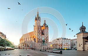 Mariacki Cathedral at Market square in Krakow at sunrise, Poland