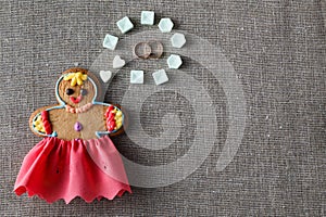Mariage concept. Gingerbread girl with wedding dream