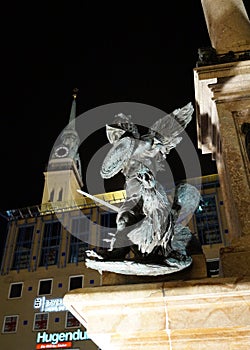 Marian Column, detail, illuminated at night, Munich, Germany