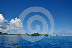 Marianne island, blue sky and Indian ocean, Seychelles photo