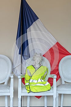 Marianne symbol of France with a yellow vest gilet jaune, the French at the Grand National debate of the citizen consultation