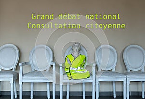 Marianne symbol of the French Republic with a yellow vest gilet jaunereceiving the French for the Big debate national consultati