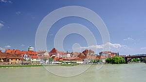 Maribor, Slovenia with Drava river waterfront Lent on a sunny day, time lapse