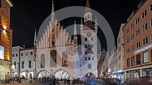 Marienplatz with the old Munich town hall and the Talburg Gate night timelapse hyperlapse, Bavaria, Germany.