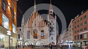 Marienplatz with the old Munich town hall and the Talburg Gate night timelapse hyperlapse, Bavaria, Germany.