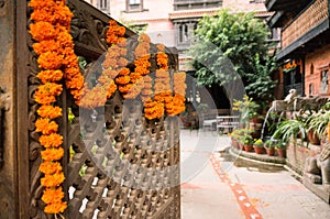Marigold flowers and Goddess Lakshmi`s footprints at the entrance of the house. Kathmandy