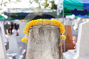 Marigold Garland over The Grave in The Annual Blessing of Graves at Ratchaburi Province, Thailand