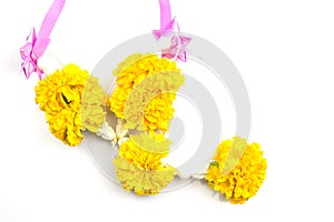 Marigold with ribbin on white background photo