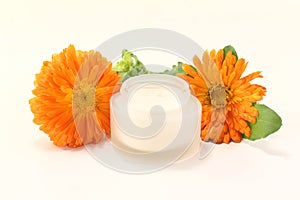 Marigold salve with flowers and leaves