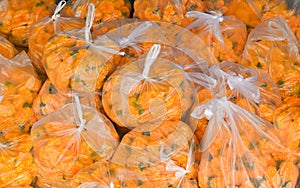 Marigolds in plastic bags for religious ceremonies