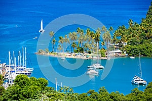 Marigot Bay, Saint Lucia, Caribbean. Tropical bay and beach in exotic and paradise landscape scenery. Marigot Bay is located on photo