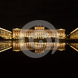 Mariinsky palace reflecting in the water at night