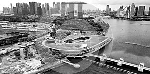 Marina Barrage, Singapore: Aerial view of cityscape and coastline on a overcast afternoon