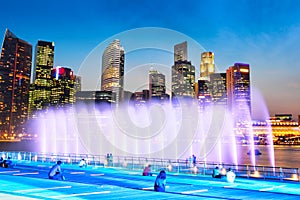 Marina Bay Fountain and Singapore Downtown Skyline at Night