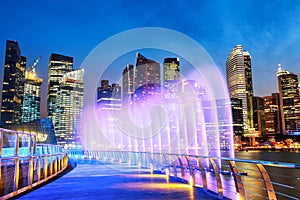 Marina Bay Fountain and Singapore Downtown Skyline at Night