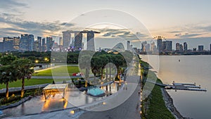 Marina Bay Sands, Gardens by the bay with cloud forest, flower dome and supertrees day to night timelapse after sunset