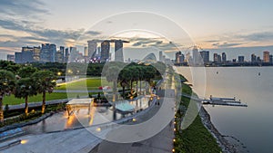 Marina Bay Sands, Gardens by the bay with cloud forest, flower dome and supertrees day to night timelapse after sunset