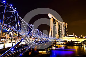 Marina bay sands with helix bridge in beautiful night time