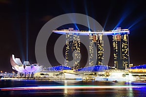 Marina Bay Sands at night during Light and Water Show 'Wonder Full' .